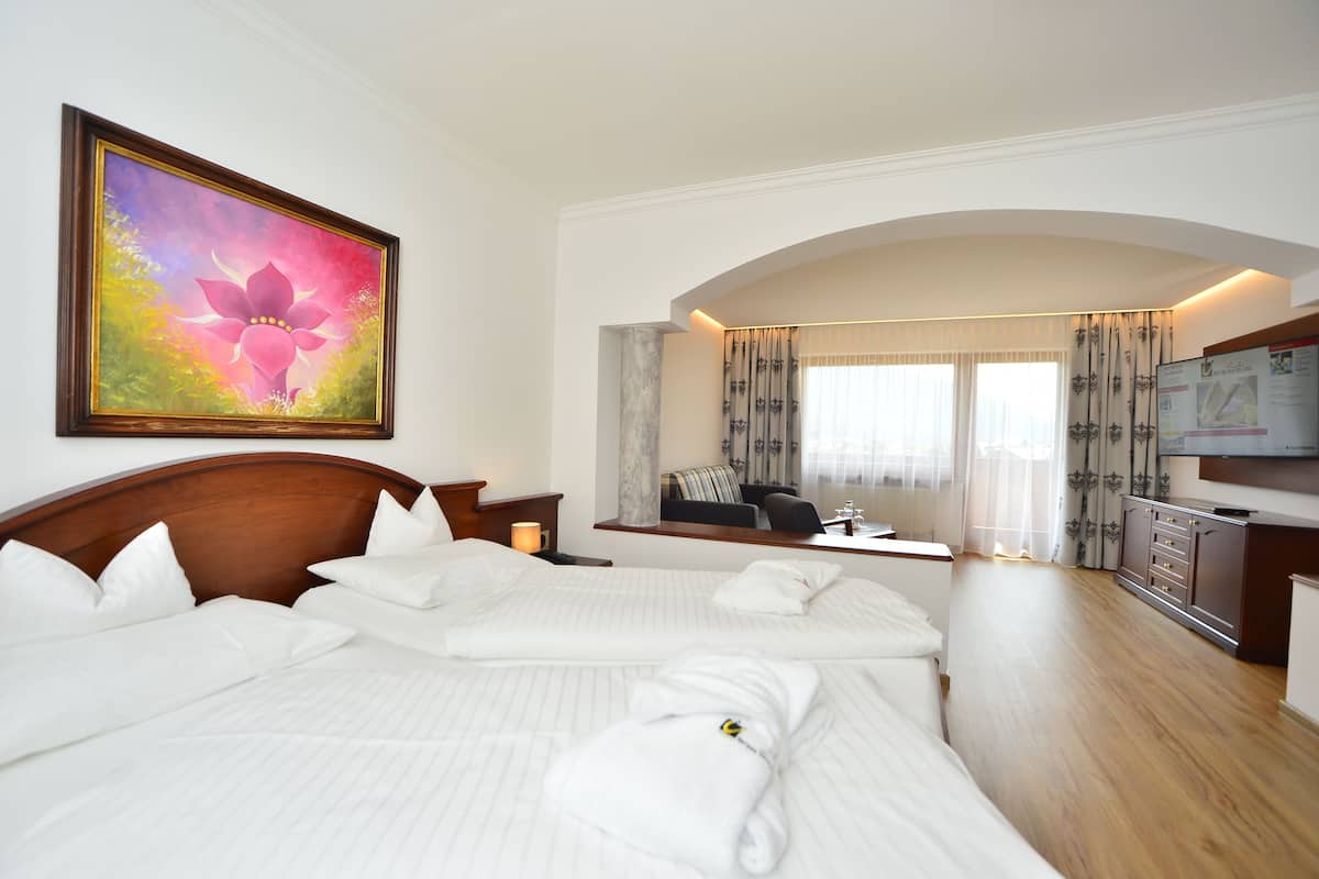 Superior Double Room, Garden Area (Tirol Sued) | Down comforters, in-room safe, desk, blackout drapes