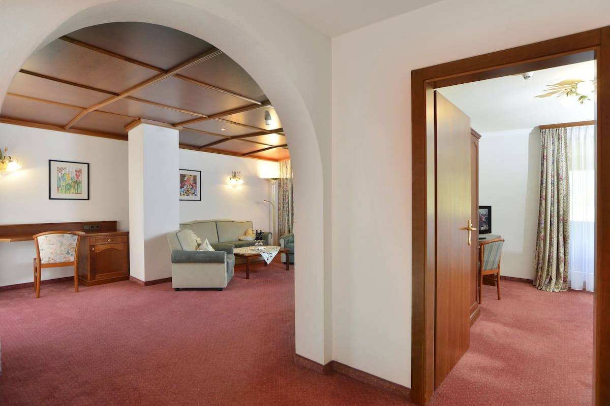 suite, 3 bedrooms, 2 bathrooms (tirol) | living area | 55-inch flat-screen tv with digital channels, tv