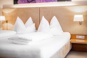 Hypoallergeen beddengoed, een kluis op de kamer, een bureau, gratis wifi