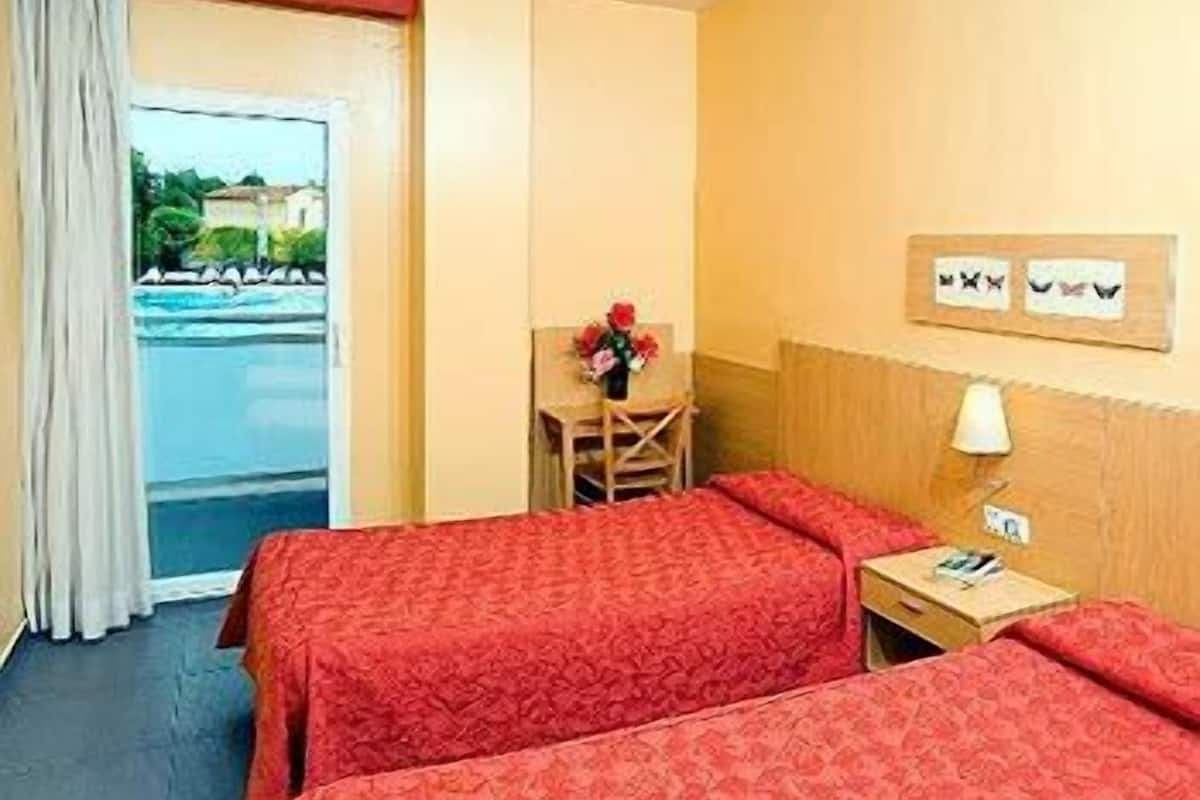 In-room safe, iron/ironing board, cribs/infant beds, WiFi