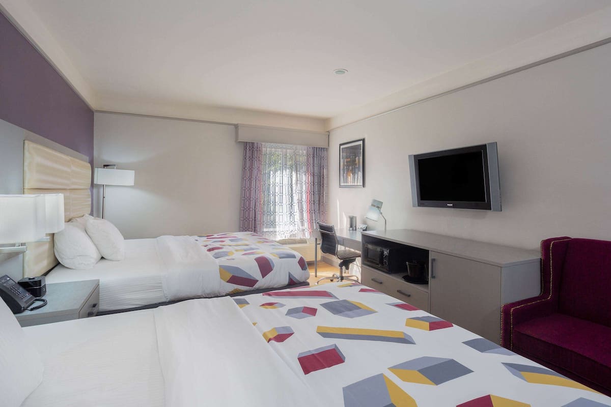 room, multiple beds | premium bedding, memory-foam beds, individually decorated