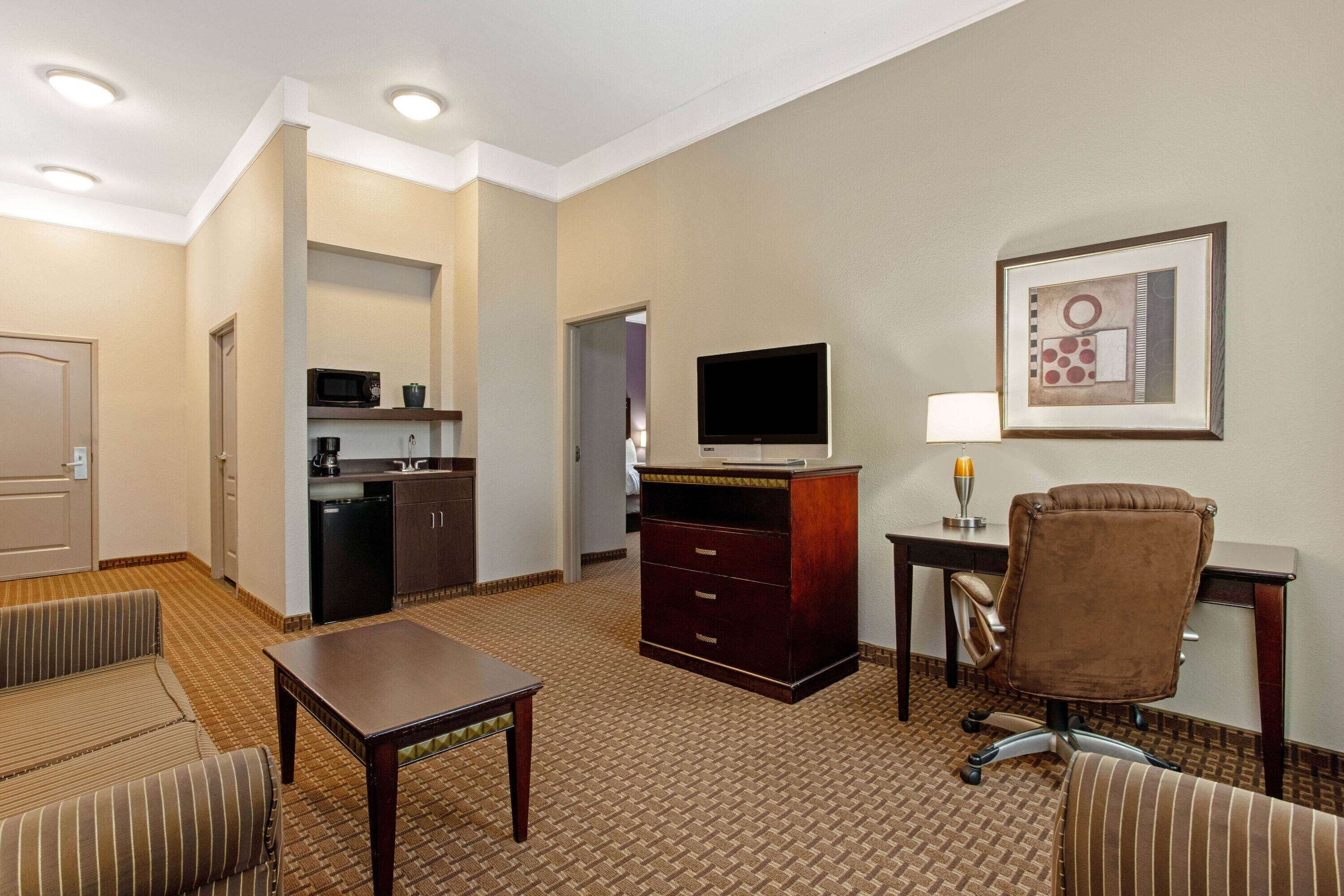 Premium bedding, desk, blackout drapes, iron/ironing board