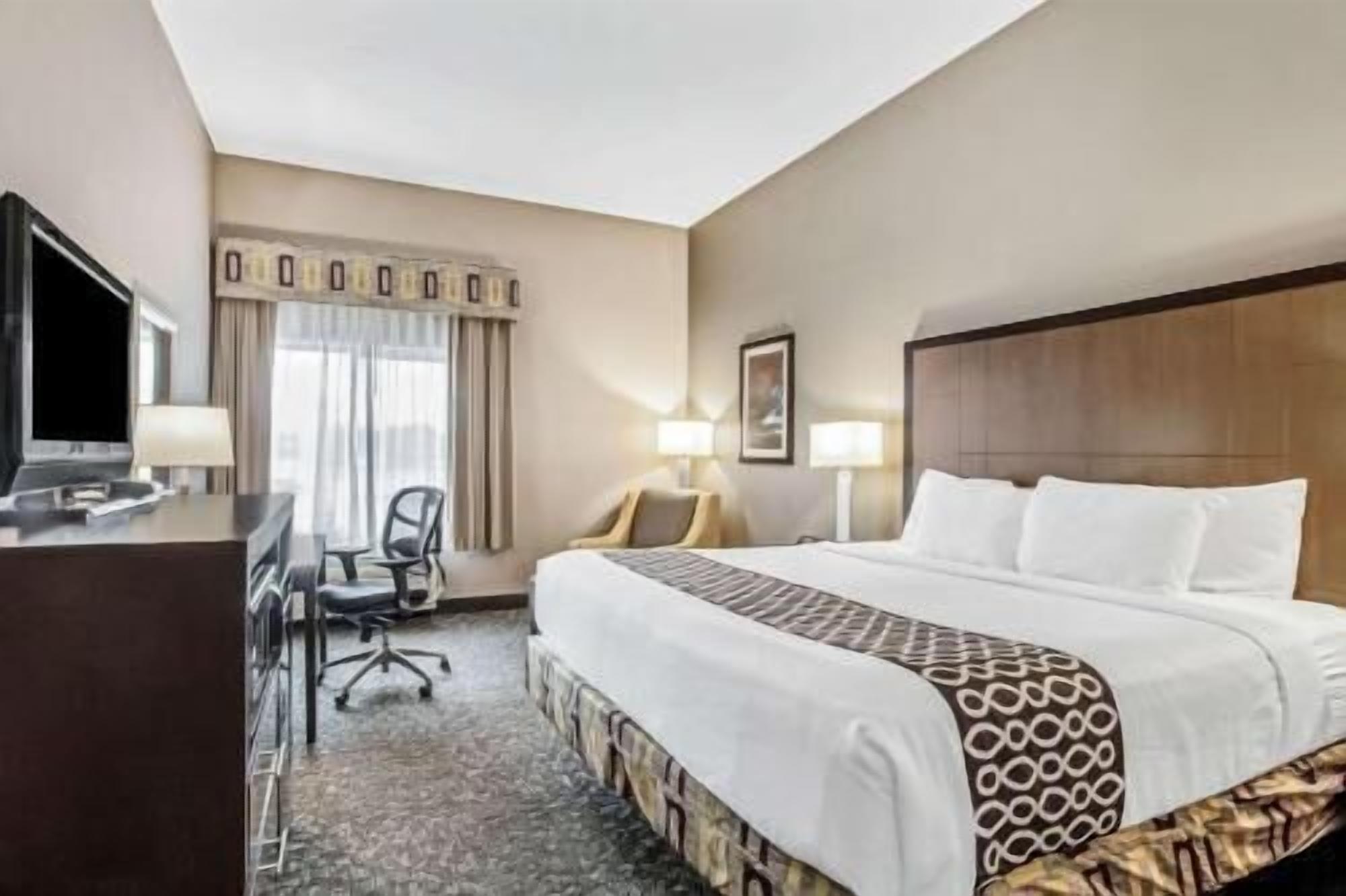 Premium bedding, desk, blackout drapes, iron/ironing board