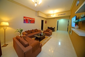 In-room safe, desk, laptop workspace, blackout drapes - Emirates Stars Hotel Apartments Dubai (Dubai)