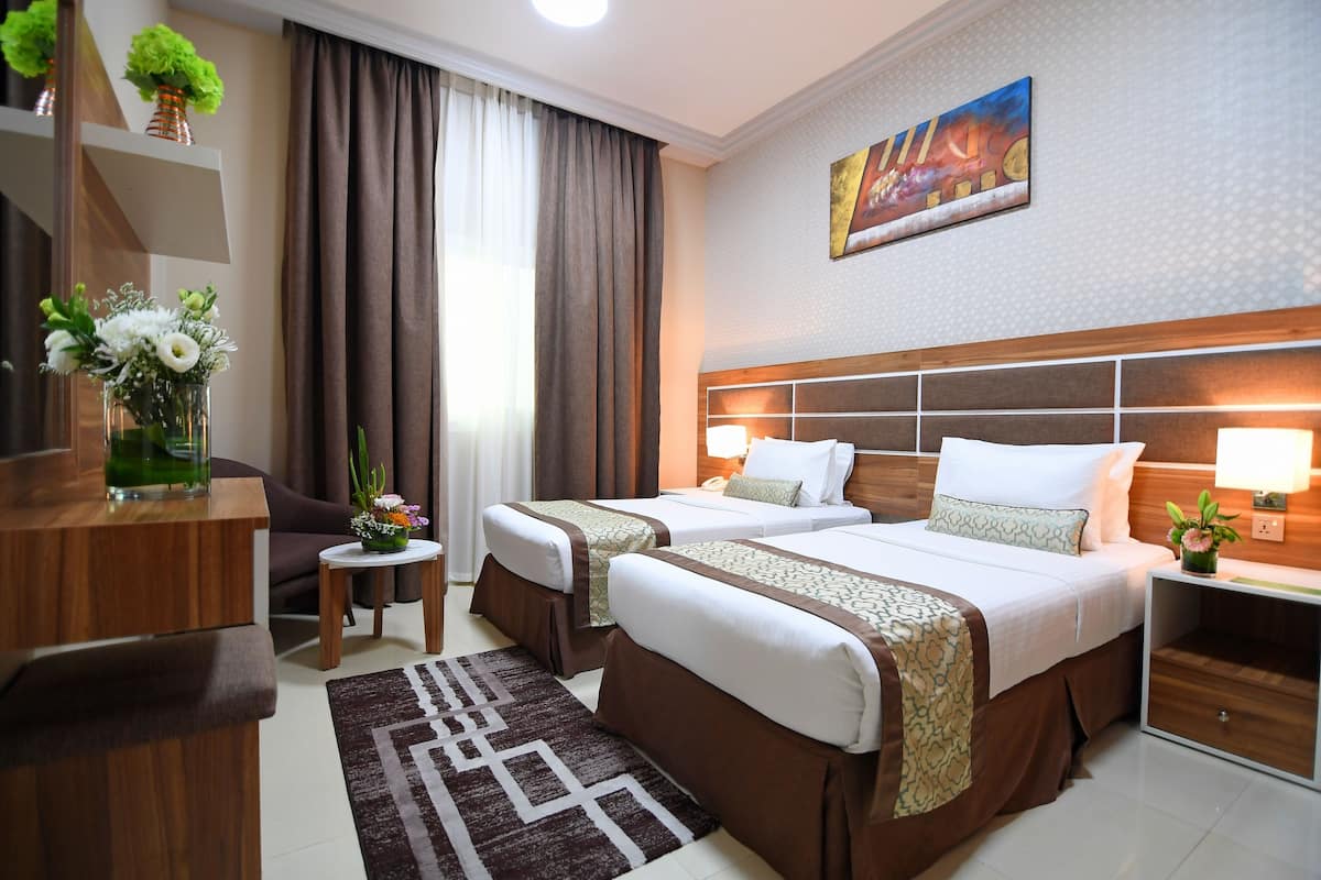 Deluxe Double Room | In-room safe, desk, laptop workspace, blackout drapes
