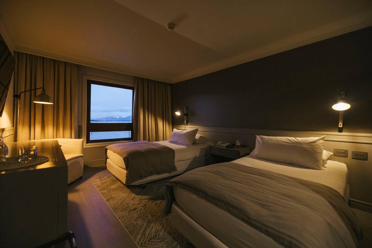 Premium bedding, down comforters, in-room safe, laptop workspace