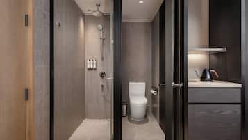 Shower, hair dryer, slippers, towels
