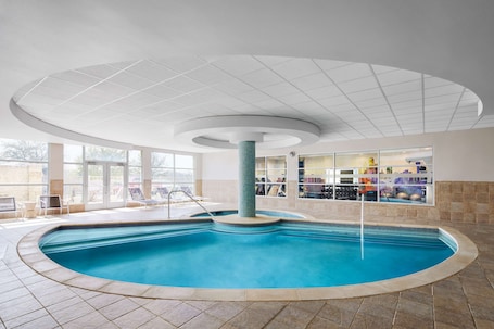 Indoor pool, open 7:00 AM to 11:00 PM, pool loungers. Hilton Garden Inn Dallas Richardson