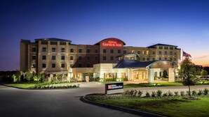 A Hilton Garden Inn with a large entrance, multiple floors, and a well-lit facade. - Hilton Garden Inn Dallas Richardson (Richardson)