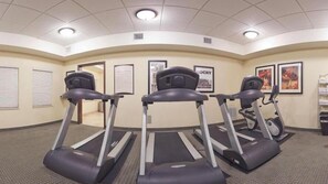 A fitness room with treadmills and an elliptical machine. - Staybridge Suites McAllen by IHG (McAllen)