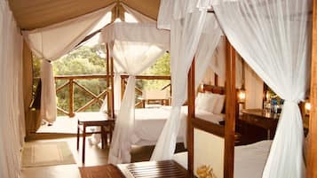 Deluxe Tent, River View | 1 bedroom, in-room safe, desk, iron/ironing board