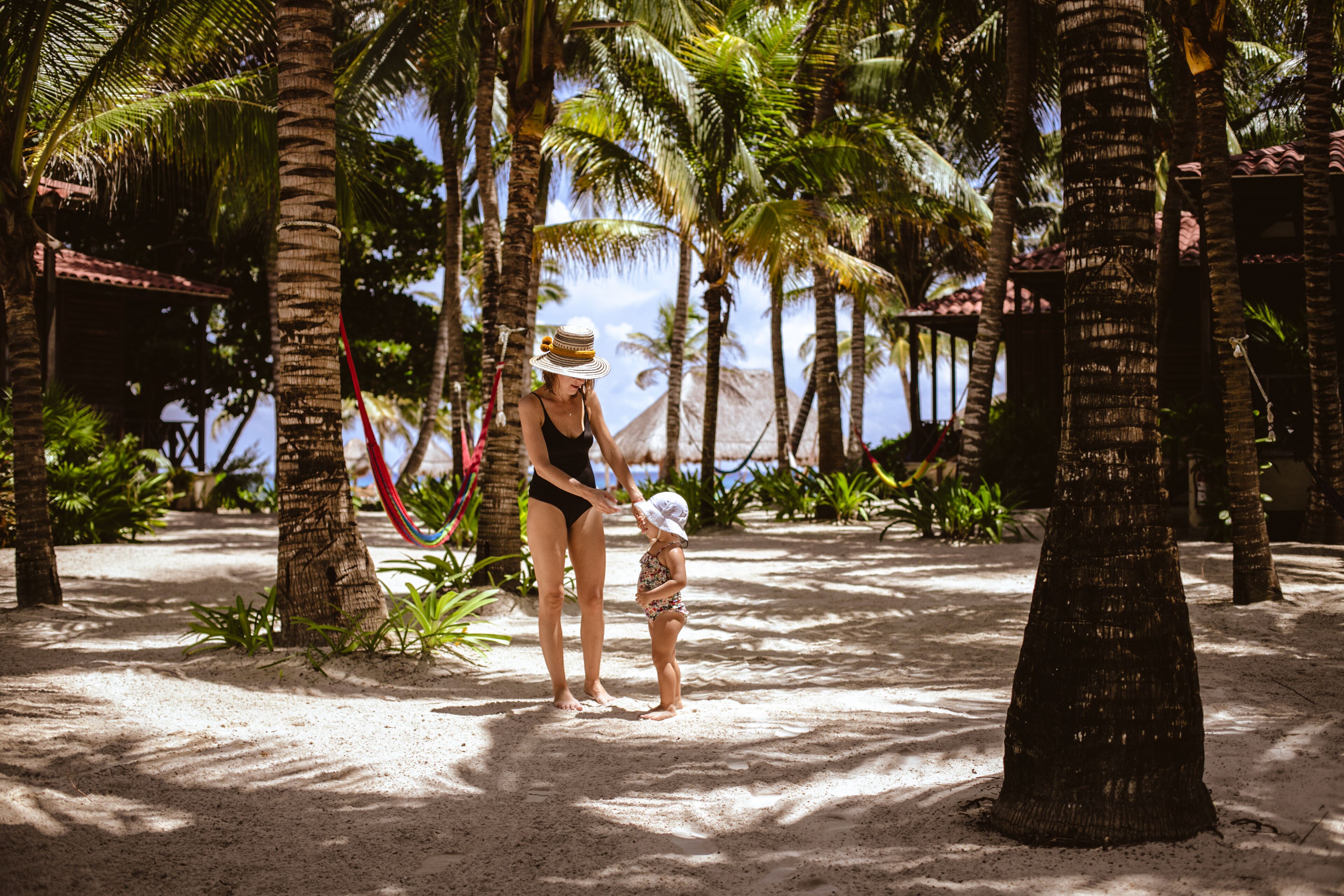 on the beach, white sand, free beach cabanas, sun-loungers