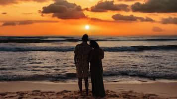 On the beach, white sand, free beach cabanas, sun loungers