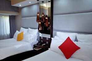 Premium bedding, free minibar, desk, iron/ironing board