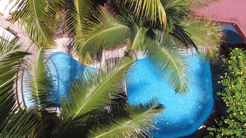 Outdoor pool, open 6:30 AM to 8:30 PM, pool umbrellas, pool loungers