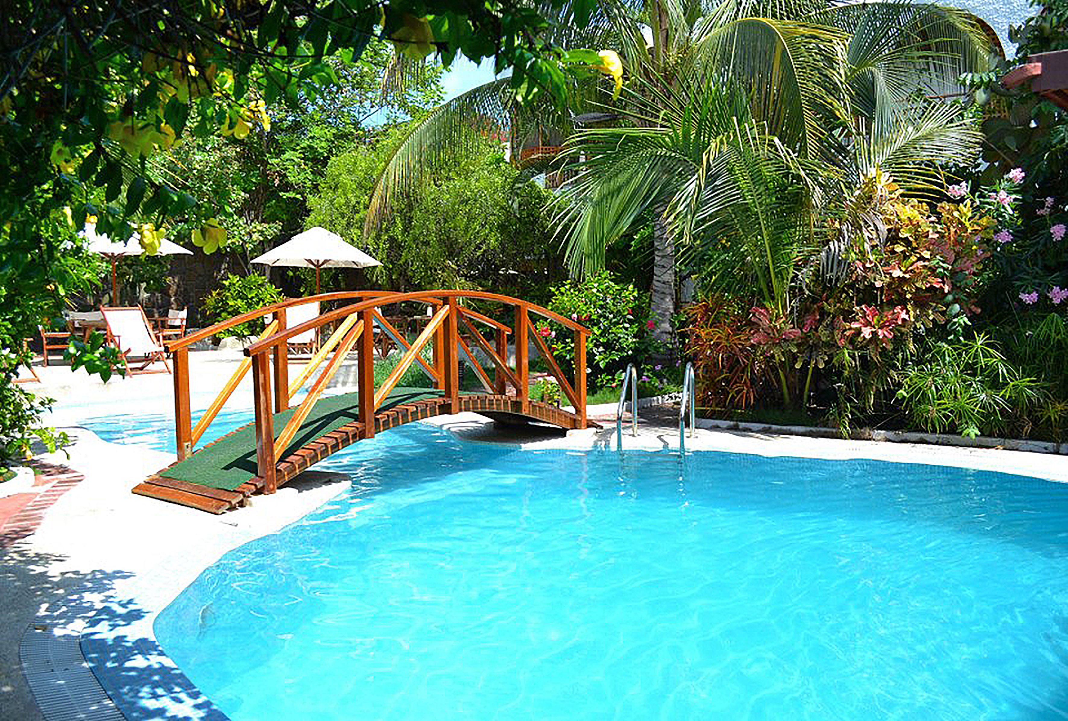 Outdoor pool, open 6:30 AM to 8:30 PM, pool umbrellas, sun loungers