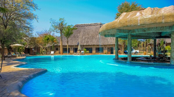 2 outdoor pools, pool umbrellas, pool loungers