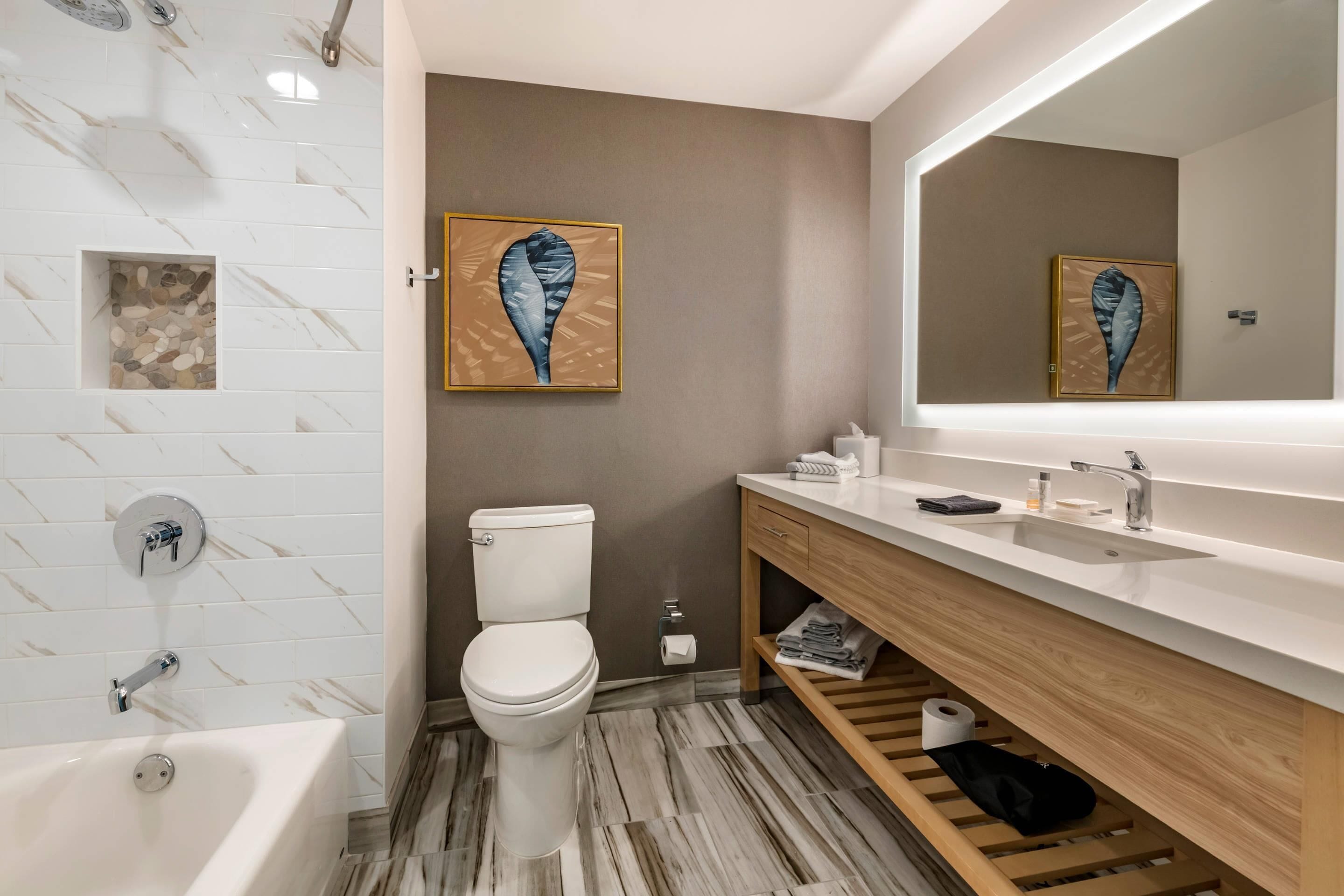 combined shower/bathtub, rainfall showerhead, hair dryer, towels