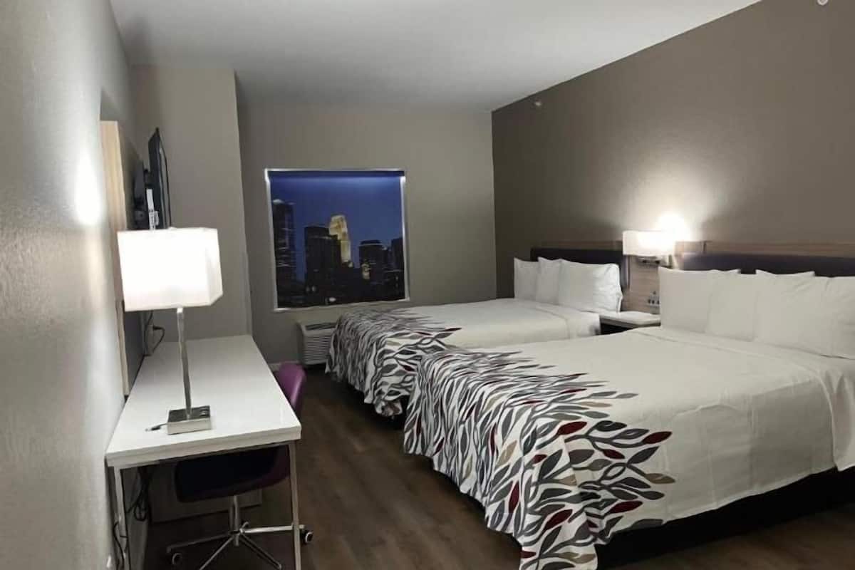 Premium bedding, down comforters, desk, blackout drapes