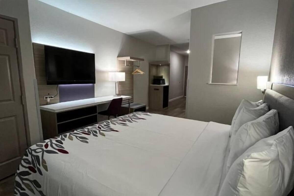 Desk, blackout curtains, free WiFi, bed sheets