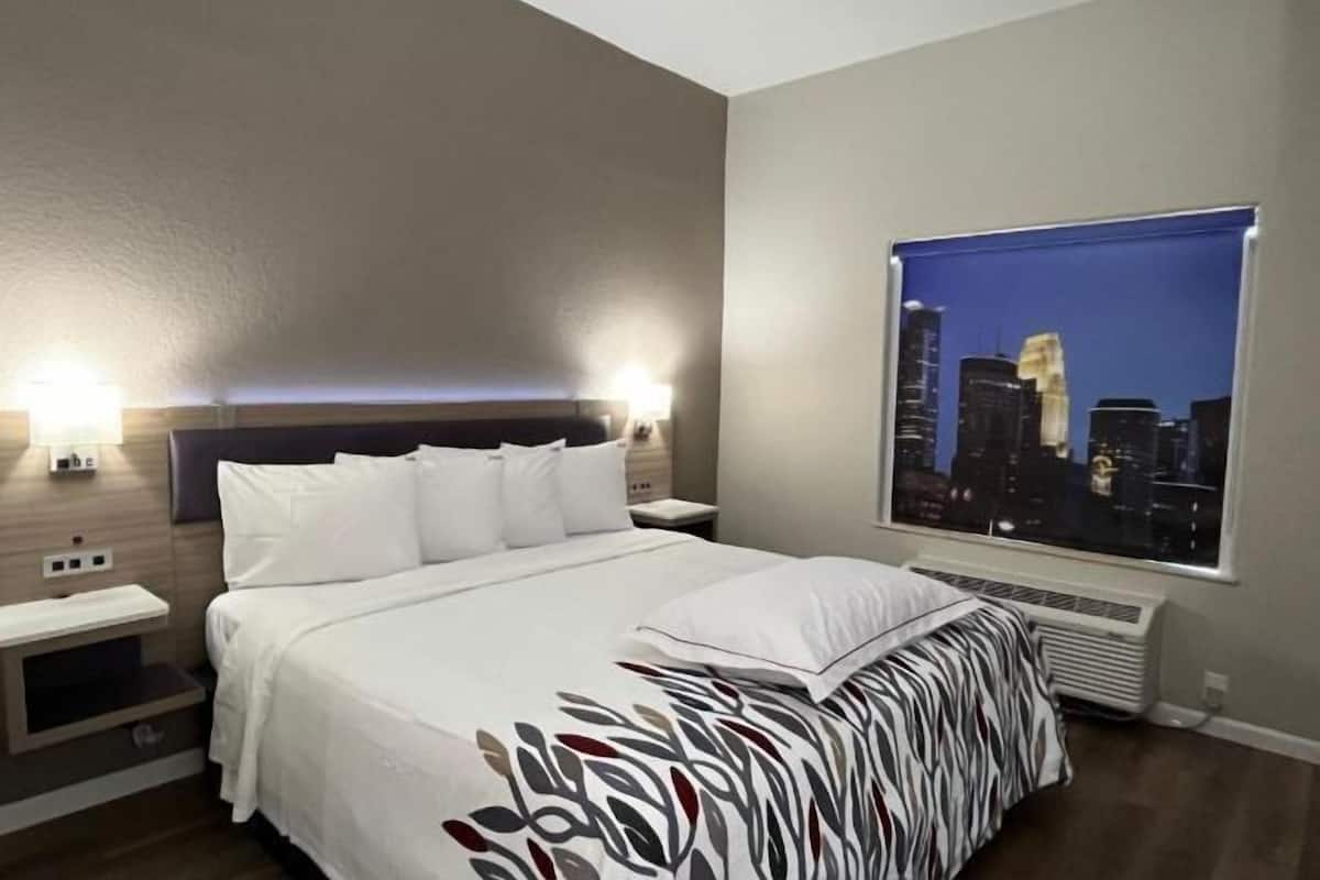 Premium bedding, down comforters, desk, blackout drapes