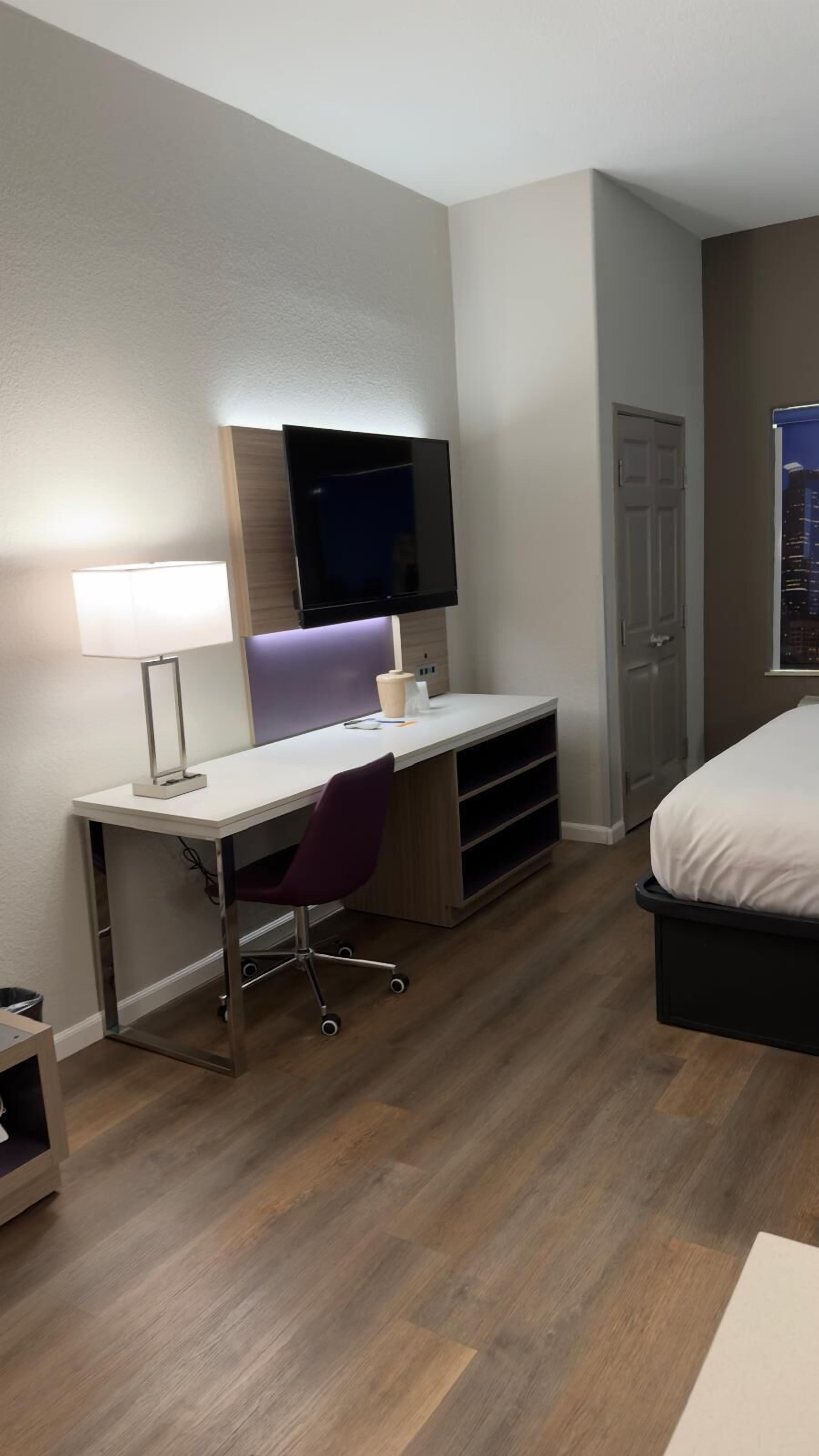 Desk, blackout curtains, free WiFi, bed sheets