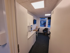 Desk, laptop workspace, free WiFi, bed sheets