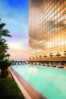 Outdoor pool, a heated pool, cabanas (surcharge), sun loungers