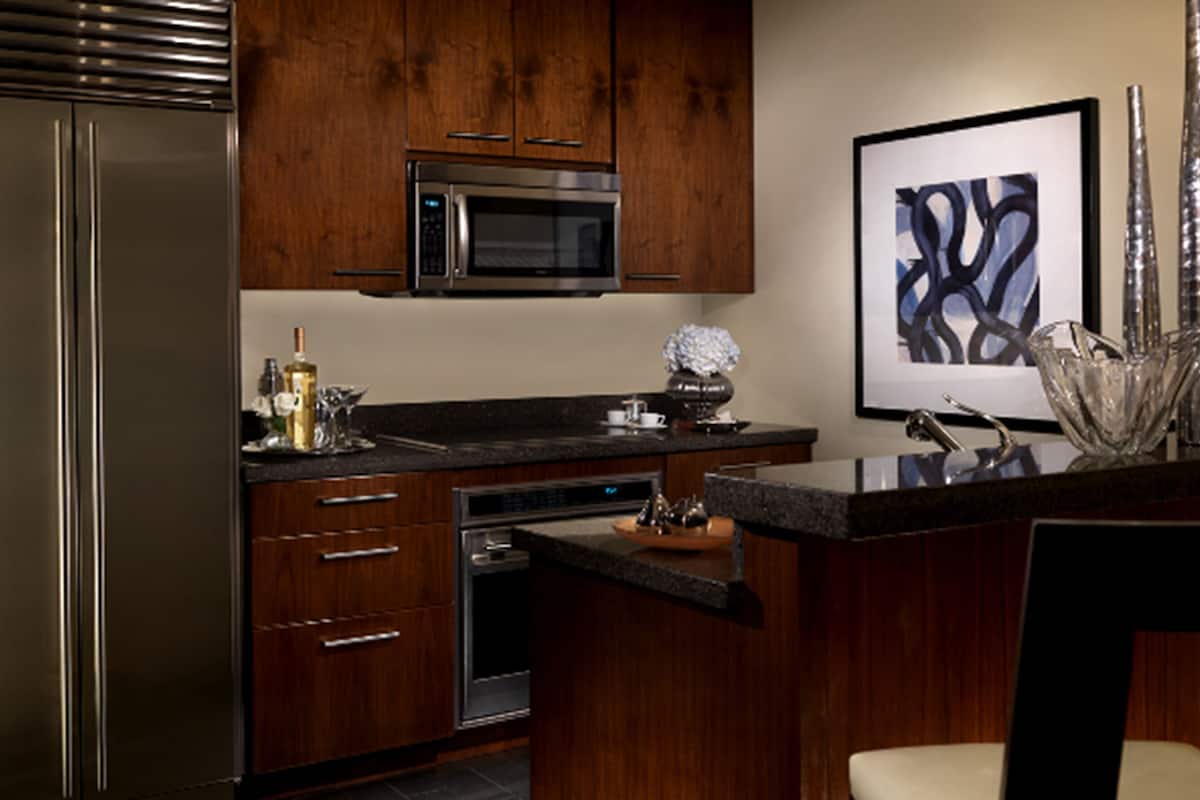 fridge, microwave, coffee/tea maker, cookware/dishes/utensils