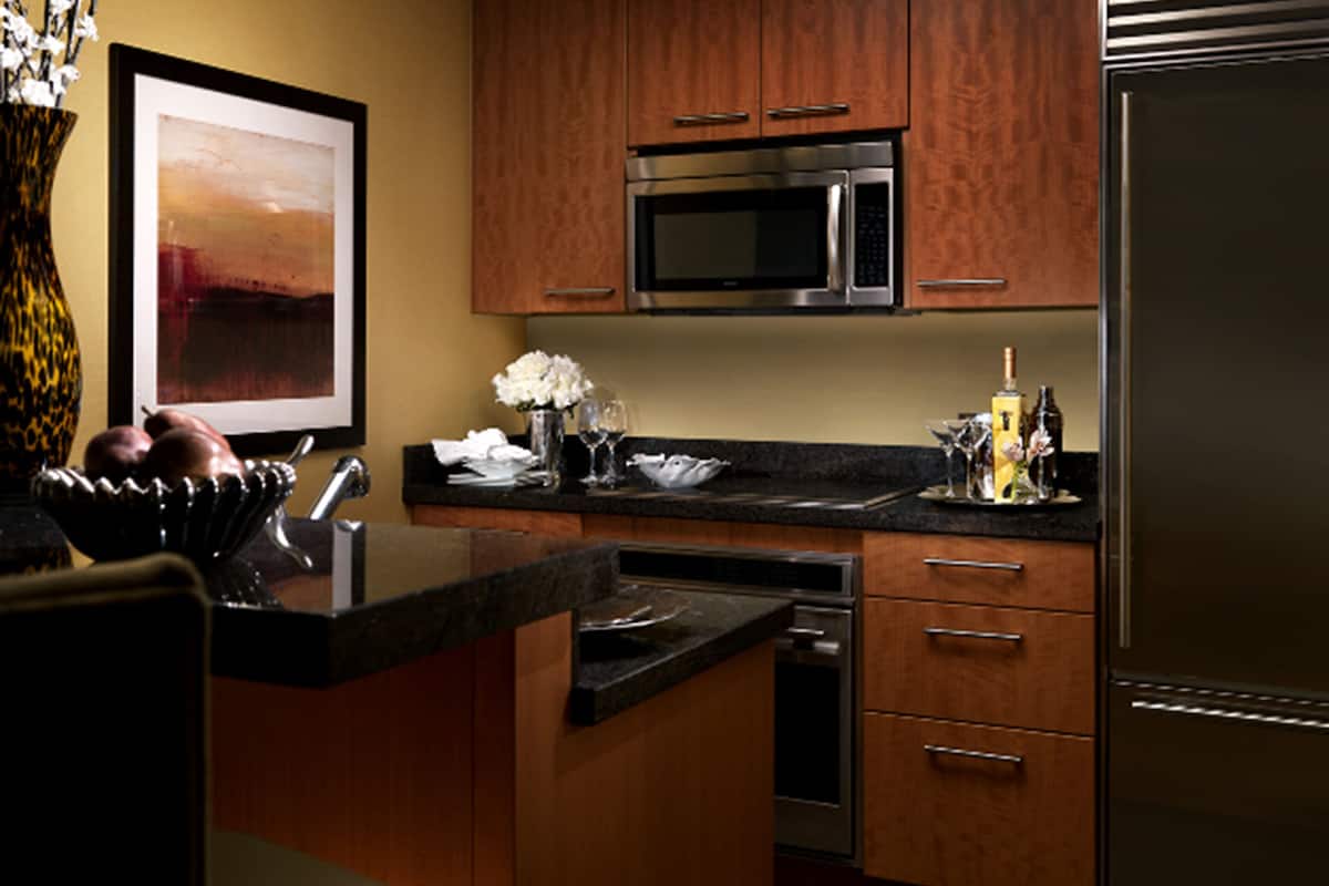 fridge, microwave, coffee/tea maker, cookware/dishes/utensils