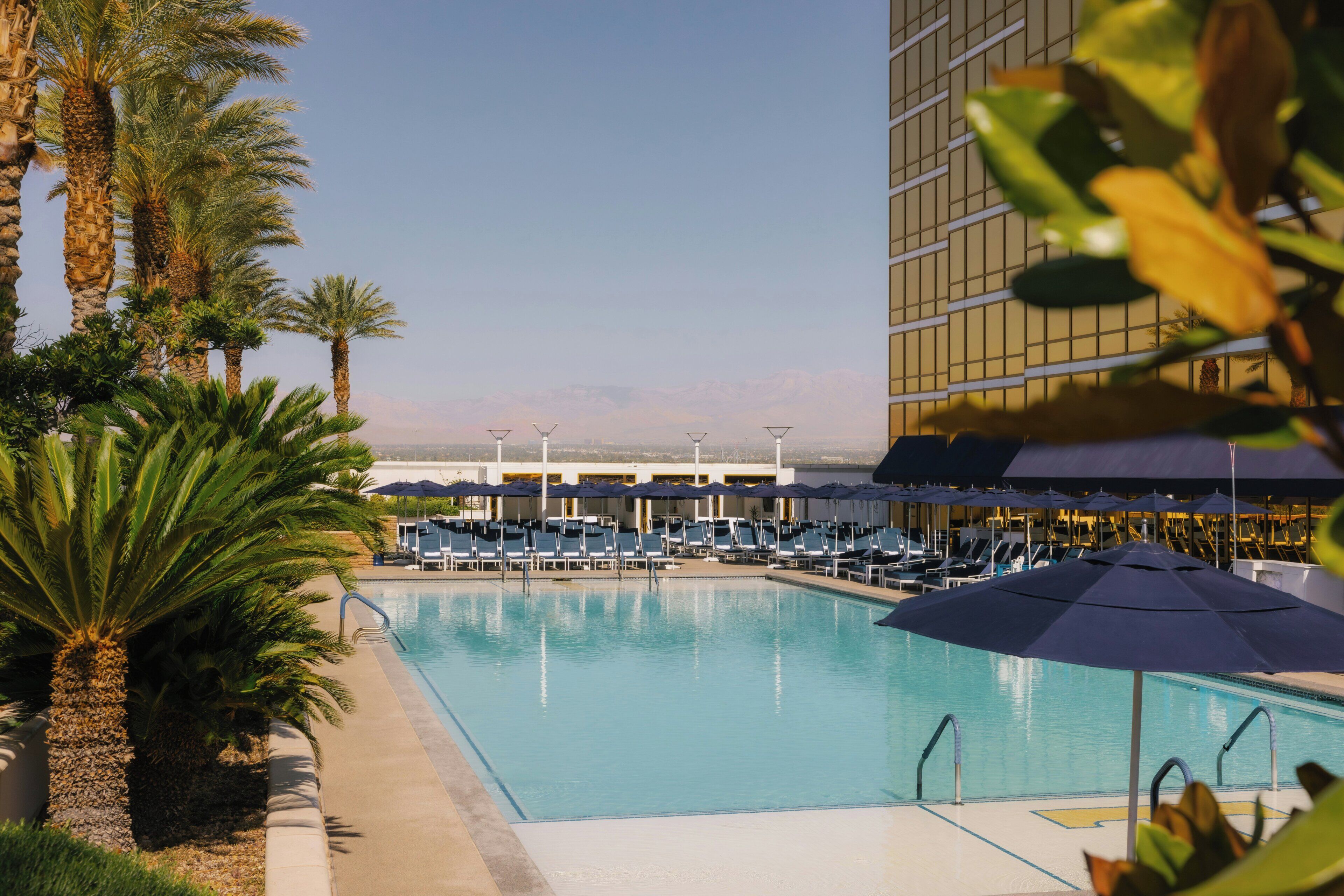 Outdoor pool, a heated pool, cabanas (surcharge), sun loungers