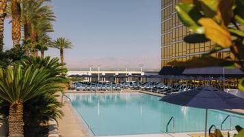 Outdoor pool, a heated pool, cabanas (surcharge), sun loungers