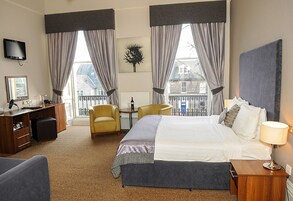 Minibar, desk, laptop workspace, iron/ironing board