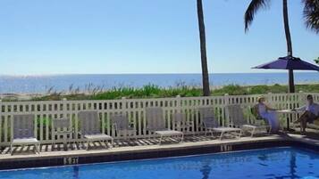 Outdoor pool, pool umbrellas, sun loungers