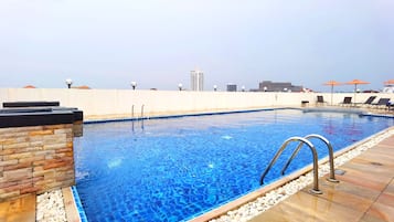 Outdoor pool, sun loungers