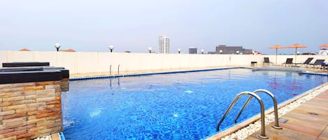 Outdoor pool, pool loungers