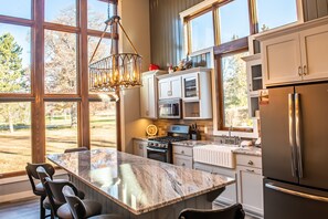 Superior Room, Multiple Beds | Private kitchen | Fridge, microwave, coffee/tea maker