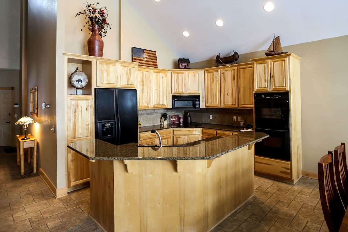 deluxe room, multiple beds | desk, iron/ironing board, bed sheets