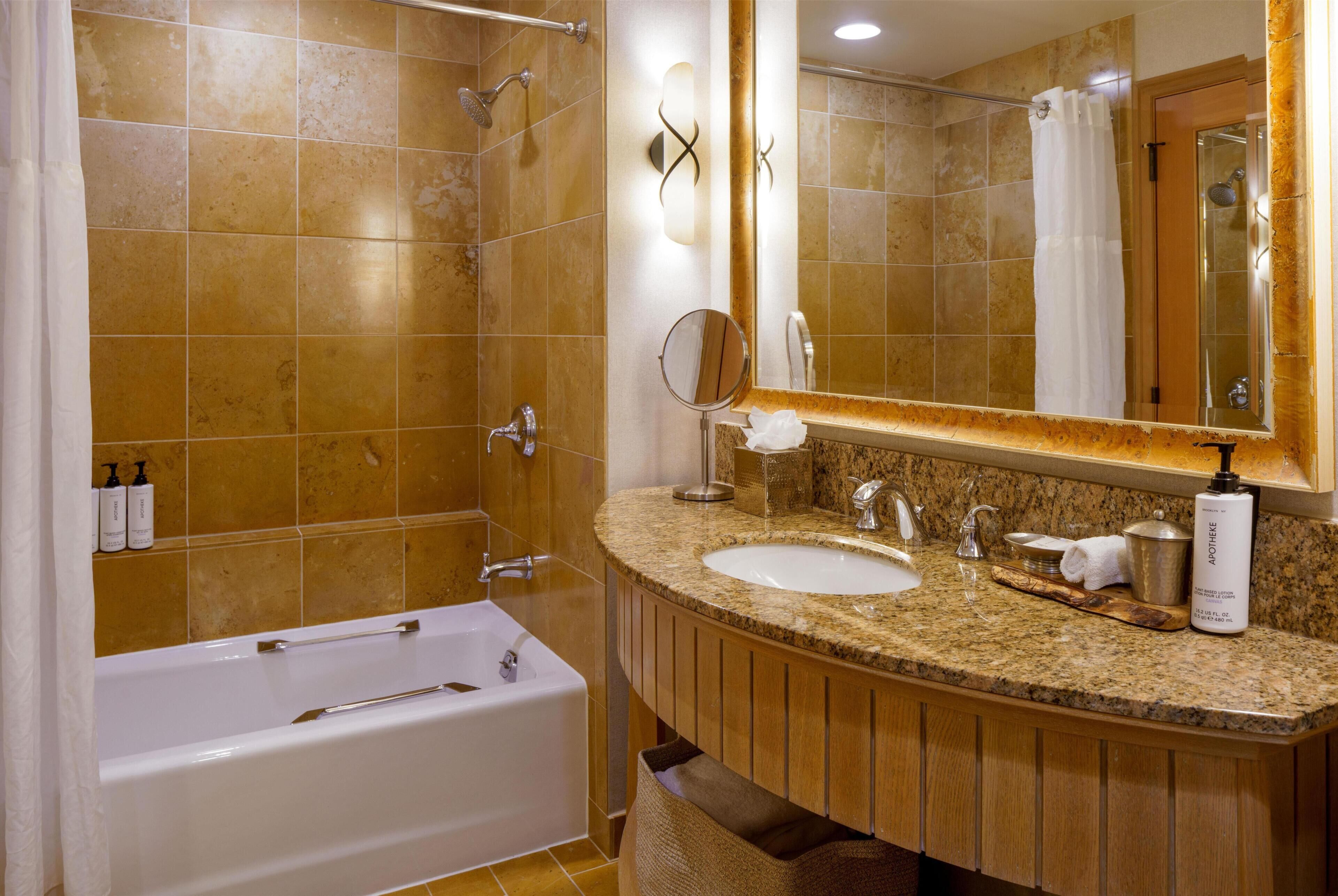 Designer toiletries, hair dryer, bathrobes, towels