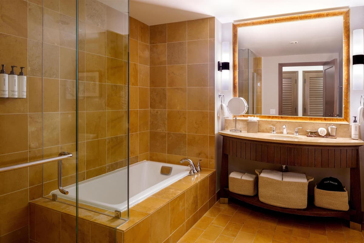 Designer toiletries, hair dryer, bathrobes, towels