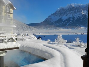 Indoor pool, outdoor pool, pool umbrellas