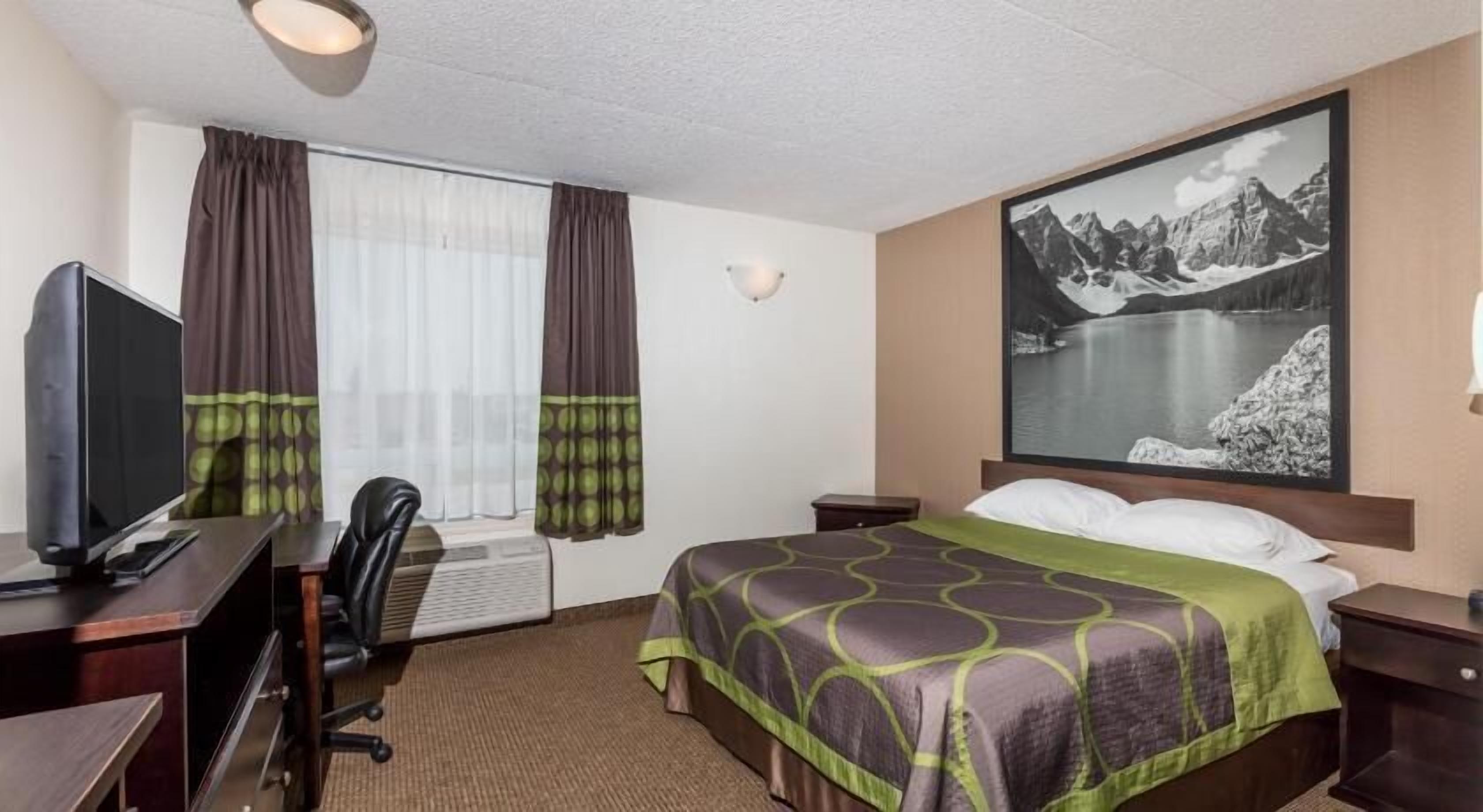 Desk, blackout drapes, iron/ironing board, free cribs/infant beds