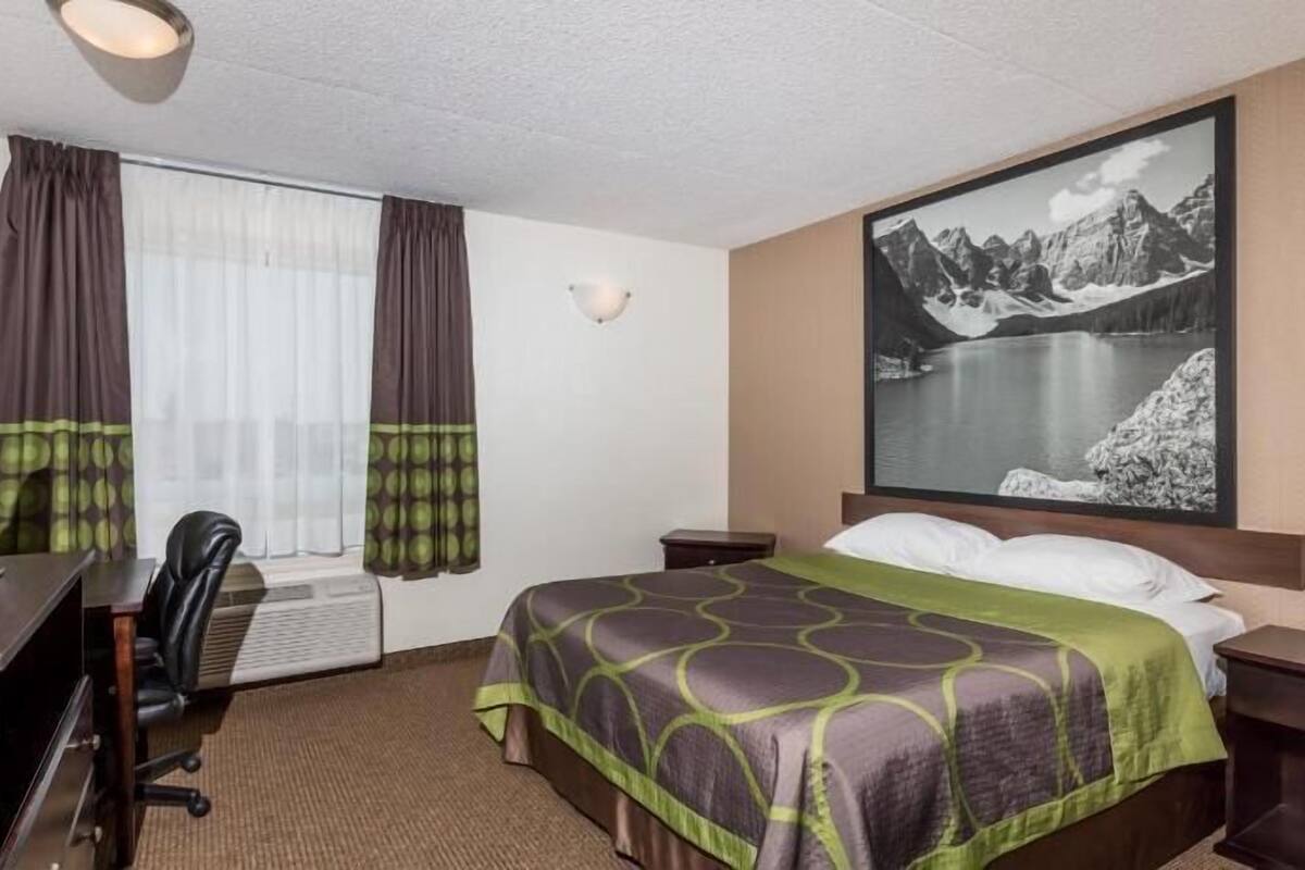 Desk, blackout drapes, iron/ironing board, free cribs/infant beds