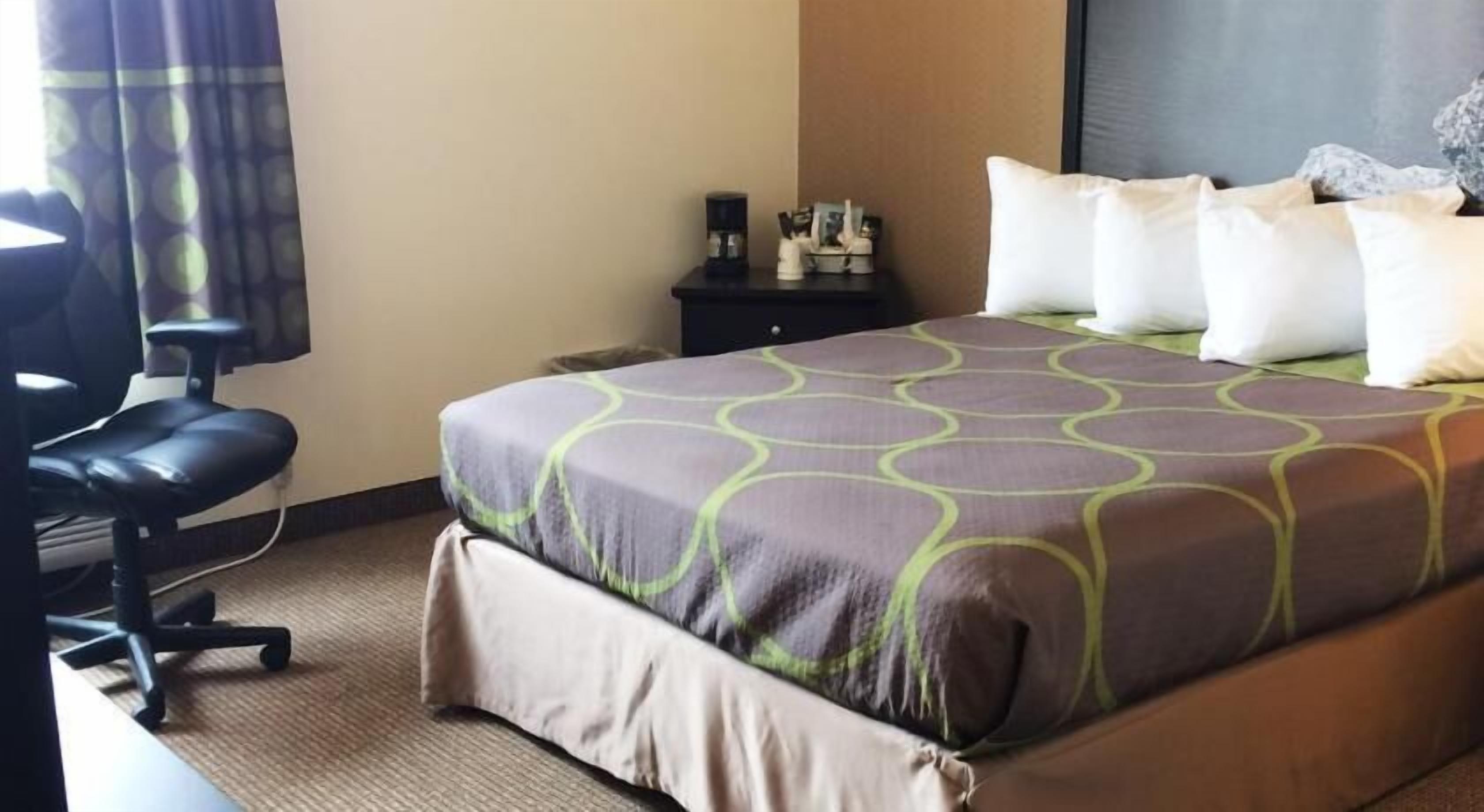 Desk, blackout drapes, iron/ironing board, free cribs/infant beds