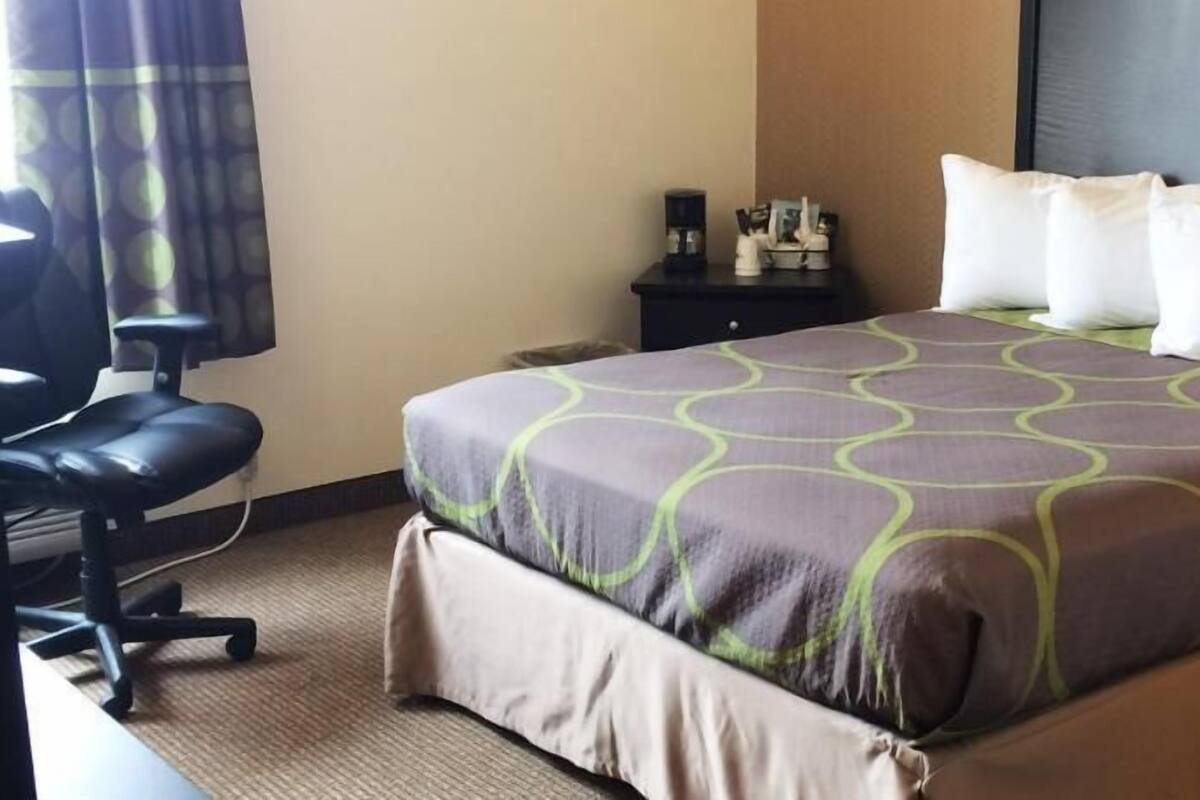 Desk, blackout drapes, iron/ironing board, free cribs/infant beds