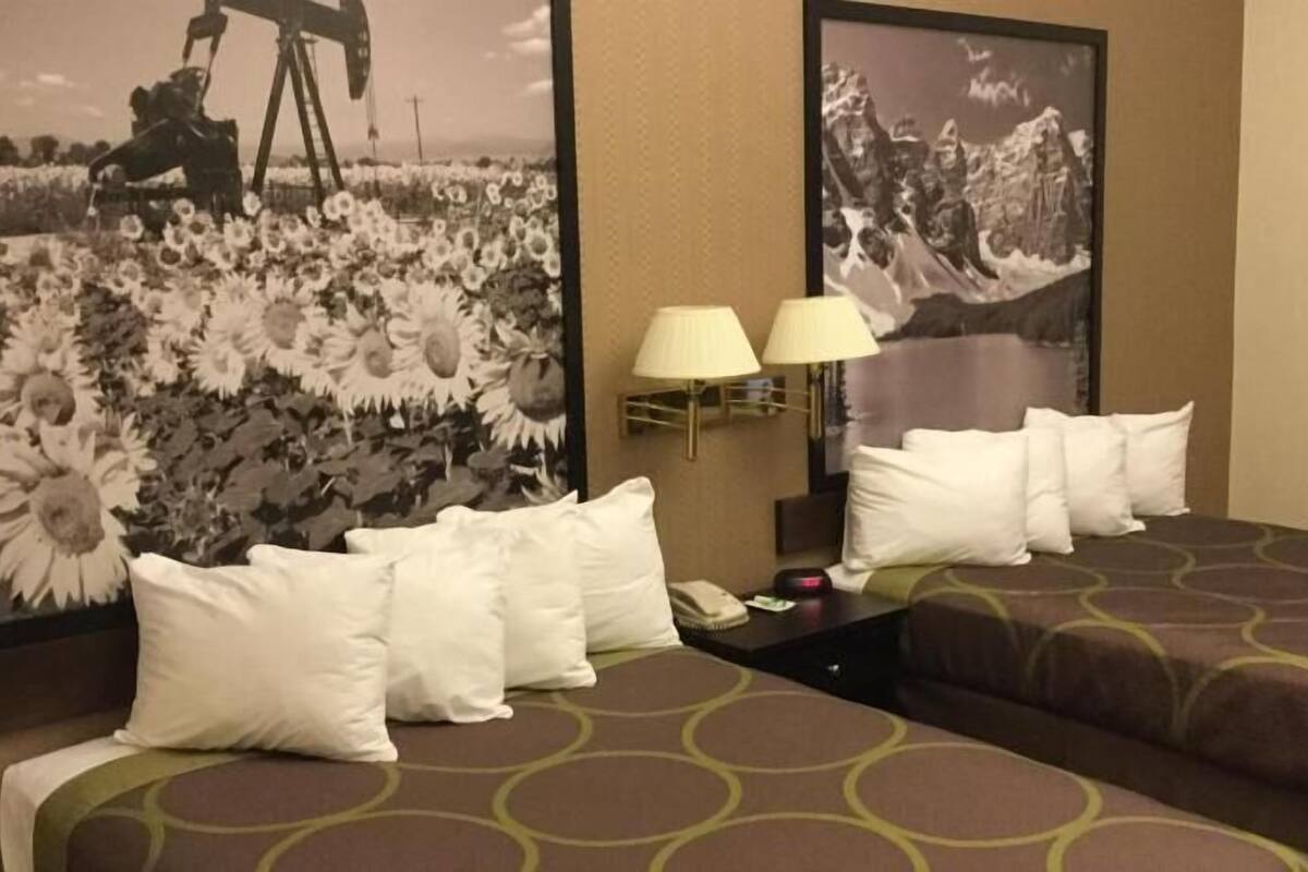 Desk, blackout drapes, iron/ironing board, free cribs/infant beds