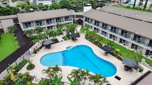 2 outdoor pools, open 8:00 AM to 8:00 PM, pool umbrellas, pool loungers