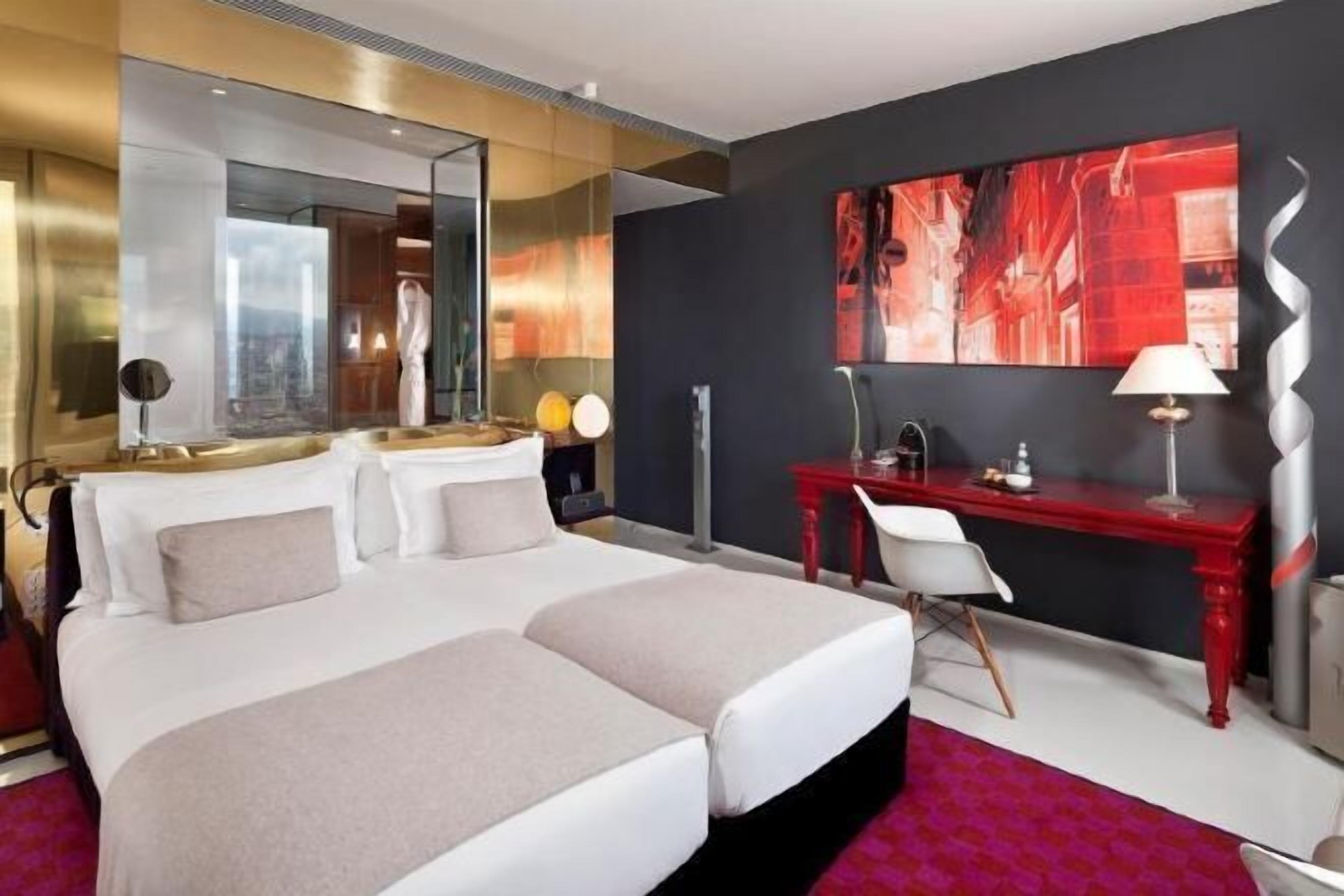 Premium bedding, pillow-top beds, minibar, in-room safe