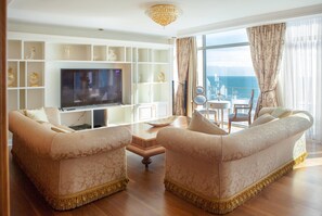 Suite, 1 King Bed | Living area | Flat-screen TV - Ramada by Wyndham Baku (Baku)