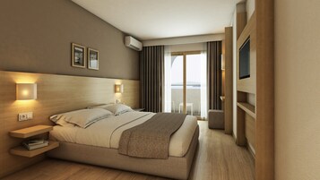 Standard Room, Sea View | Minibar, in-room safe, bed sheets